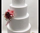 4 tier white stencilled wedding