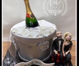 silver wedding with real champagne bottle & personalised figures